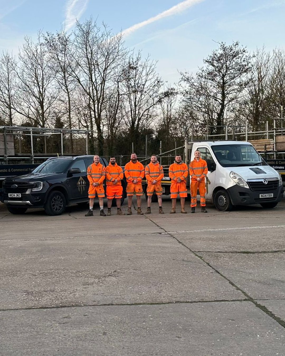 The HTK Scaffolding crew with their vehicles
